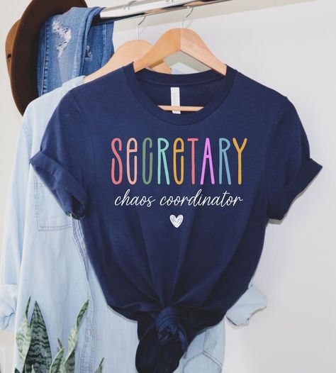 This Gender-Neutral Adult T-shirts item by EmpathyGarden has 7 favorites from Etsy shoppers. Ships from Raleigh, NC. Listed on Aug 4, 2024 Elementary Secretary, School Secretary Outfits, Diy Shirt Printing, Nurse Things, Secretary Gifts, Secretary Outfits, School Secretary, Education Shirts, Office Shirt