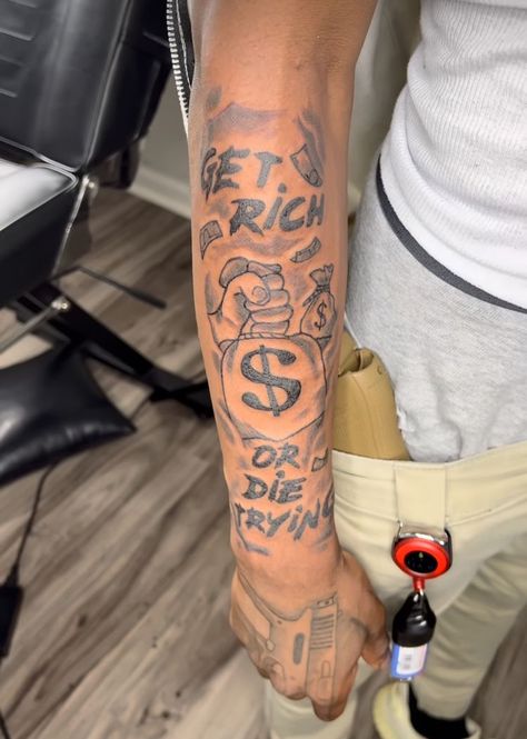 Tattoo Sleeve Men Upper Arm, Chase The Bag Tattoo, Nfl Never Forget Loyalty Tattoo, Money Quotes Tattoos, Hand Connected To Arm Tattoo, Half Sleeve Tattoos Black Mens Arm, Tattoo Ideas Black Male, Half Sleeve Tattoos For Black Guys, Hood Sleeve Tattoos For Guys