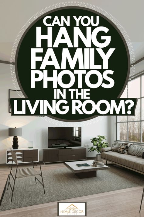 Can You Hang Family Photos In The Living Room? - Home Decor Bliss Family Portrait In Living Room, Framed Family Pictures In Living Room, Photo Display In Living Room, Canvas Prints On Wall Layout Living Room, Living Room Family Picture Wall Ideas, Framed Pictures On Wall Living Rooms, Photos On Wall Ideas Living Room, Where To Place Family Photos In Home, Photo Gallery Living Room