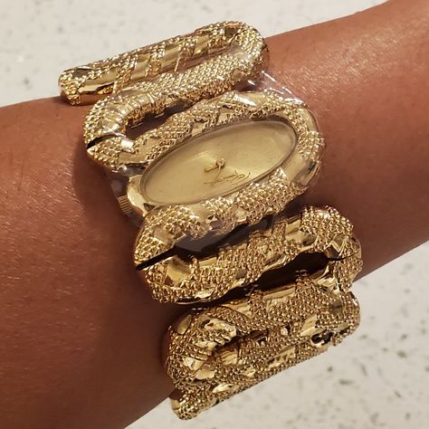 Authenticroberto Cavalli Cleopatra Women's Gold Tone Snake Bracelet Watch New With Tags, Includes Box Msrp: 608.85 Brushed Gold Tone Oval Analog Face Polished Gold Tone Snake Form Hour And Minute Hands Roberto Cavalli Logo At The 12 O'clock Position Gold Tone Stainless Steel Fixed Bezel Stainless Steel Case Back Polished Gold Tone Raised Texture Stainless Steel Bangle Style Watch Band Push Action Inset Closures No Low Ball Offers! Bundle For Discounts. Buy With Confidence. Fast Shipping! Gold Bangles Black Women, Going Out Jewelry, Gold Wire Wrapped Jewelry, Roberto Cavalli Jewelry, West African Jewelry, Jelewry Gold, Funky Gold Jewelry, Moroccan Gold Jewelry, Gold Maximalist Jewelry