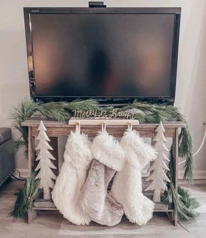 Stocking On Tv Stand, Christmas Stockings On Tv Stand, Christmas Stocking Mantle, Stocking Holder Ideas No Mantle, Christmas Stocking No Fireplace, Christmas Stocking No Mantle, Stocking Placement No Fireplace, Diy Stocking Holder For Wall, Stocking Display No Mantle