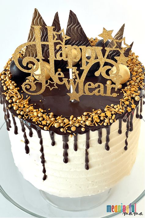 This black and gold New Year's cake provides both a beautiful and tasty way to ring in the new year. With a modern design and flavors of vanilla, chocolate, and strawberry, I hope this cake helps motivate your own cake creations. Happy New Years Cake Ideas, New Years Cake Ideas 2024, New Year’s Eve Cakes, New Years Cakes Ideas, New Years Cake Design, Nye Cake Ideas, New Year’s Eve Cake Ideas, New Year Cake Design 2024, New Year Cake 2024