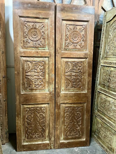 Pair Of UNIQUE Rustic Antique Barndoors, Vintage Carved Doors, Sliding Barn Door, Interior Door, Floral Carved Barn door, come pick up at the Longwood, Florida warehouse, Call us today ! #farmhouseinteriors #floridainteriordesign #nashvilleinteriors #chicagointeriordesign #jacksonholeinteriordesign #nyinteriordesign #interior #antiquedoor #interiordesinger #carvedwood #slidingbarndoors #hoteldesign #farmhousedesign #mogulinterior #artisandoors #antiqueindiandoors #interiorfurniture #interiord... Barn Door Interior, Florida Interior Design, Chicago Interior Design, Wood Barn Door, Indian Doors, Door Interior, Double Barn Doors, Interior Design Elements, Unique Interior Design