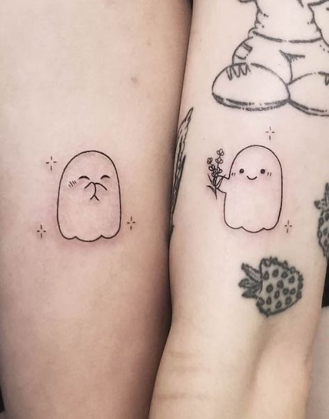 60 Cute and Creative Couple Tattoo Ideas You'll Adore Connecting Hand Tattoos For Couples, Black And White Sister Tattoos, Mario Couple Tattoos, Non Basic Matching Tattoos, Matching Tattoos Ghost, Matching Connecting Tattoos, Matching Unmatching Tattoos, Matching Nerd Tattoos, Matching Ghost Tattoos For Couples