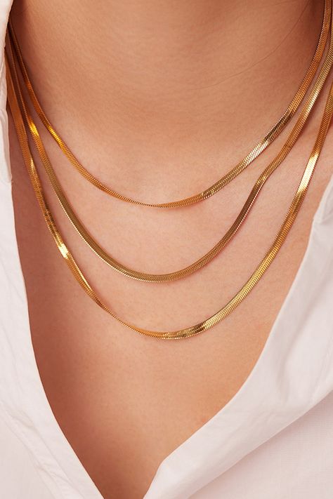 Pair this triple-layered snake chain necklace with a low-key T-shirt for a casual aesthetic. Picture style: Studio, ghost mannequin, flat lay Features: Triple-layered, snake chain Material: Stainless steel Care: Avoid wearing during exercise, as sweat will react with the jewelry to produce silver chloride and copper su Mafia Wives, Ghost Mannequin, Gold Snake Chain, Layered Chain Necklace, Picture Style, Snake Chain Necklace, Aesthetic Picture, Layered Chains, Classy Jewelry