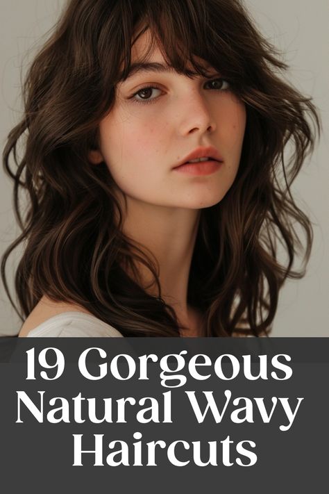 Portrait of a woman with natural wavy hair and bangs, with text "19 Gorgeous Natural Wavy Haircuts". Medium Flippy Hairstyles, Medium Length Hair For Thick Wavy Hair, Haircuts To Enhance Waves, Cute Hair Cuts For Girls Wavy, Wavy Natural Haircut, Short Wavy Hair With Curtain Bangs And Layers, Haircut For Medium Length Wavy Hair, Short Layered Haircuts On Long Hair, Wavy Shag Haircut No Bangs