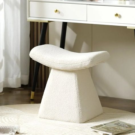 Step into a world of elegance with the Havana Boucle Stool, where functionality meets chic design. This anvil-shaped marvel isn't just a stool, it's a versatile piece that effortlessly transitions from a makeup stool to a sophisticated footrest, enriching any corner of your home with its presence. Why You'll Love It: Versatile Charm: Whether it's part of your vanity ensemble, a stylish shoe-changing spot, or a cozy footrest, the Havana Boucle Stool adds a layer of sophistication to your daily routines. Sleek Design: With its unique anvil shape, this stool is a conversation starter, blending seamlessly into modern and traditional decors alike. Key Dimensions: Height: 47 cm Seat: 50 x 35 cm Crafted for those who appreciate the finer things in life, the Havana Boucle Stool is more than just s Boucle Stool, Makeup Stool, Modern And Traditional Decor, Stylish Shoe, Stool Chair, Daily Routines, Stylish Shoes, Chic Design, Kitchens Bathrooms