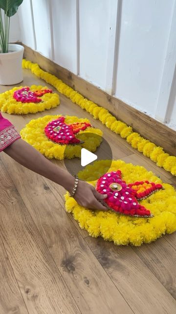 Indu Sharma | Easy Diwali DIY 🪔 
I created this vibrant diya wall hanging/rangoli mat using cardboard, colorful pom-poms, mirrors for that festive... | Instagram Diwali Home Decor, Home Decor Easy Diy, Diwali Decorations At Home, Festive Home Decor, Diwali Diy, Wall Piece, Flower Rangoli, Diwali Decorations, Pom Poms