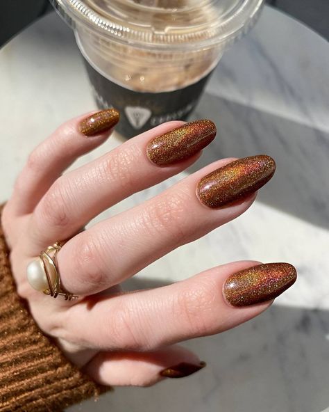 30 Dark Moody Vamp Nail Ideas Perfect For Fall - 218 Bronze Almond Nails, Bronze Fall Nails, Bronze Sparkle Nails, Fall Sparkly Nails, Bronze Glitter Nails, Short Almond Nails Designs Fall, Round Fall Nails, Almond Nails Fall Colors, November Nail Ideas Gel