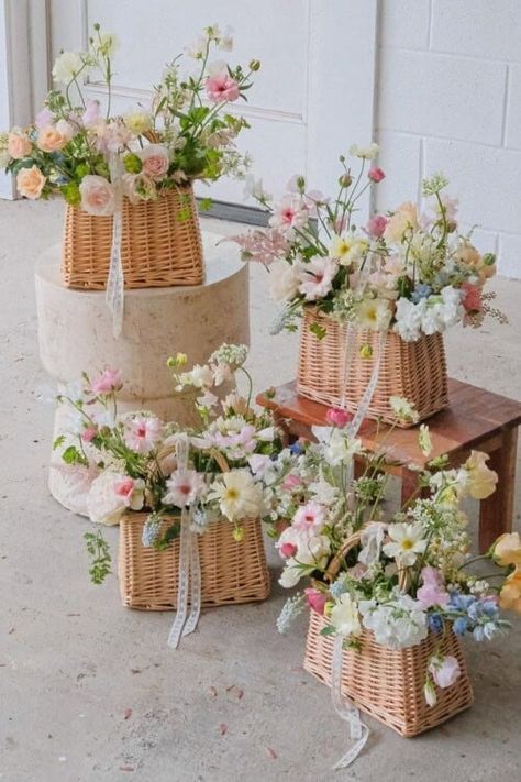 Unconventional Bridesmaid Bouquets: 15 Unique Alternatives Wicker Basket Bouquet, Wedding Flower Basket Ideas, Purse Bouquet Bridesmaid, Bridesmaids With Baskets, Basket Flower Centerpieces, Bridesmaid Floral Basket, Bridesmaid Purse Bouquet, Flowers In Baskets Wedding, Bridesmaid Basket Bouquet