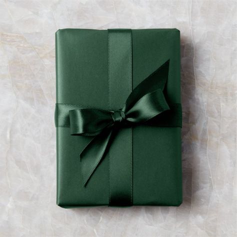 Dark green double-faced satin ribbon sports a lustrous sheen on both sides. Looks especially festive and chic when paired with our dark green gift wrap for a tonal effect. CB2 exclusive.  -Satin -1.5andamp;quot; wide -10 yards -Made in Vietnam Dark Green Holiday Ribbon Gold Wrapping Paper, Green Wrapping Paper, Modern Christmas Ornaments, Black Wrapping Paper, Unique Holiday Decor, White Christmas Ornaments, Modern Christmas Decor, Christmas Stocking Holders, Holiday Ribbon