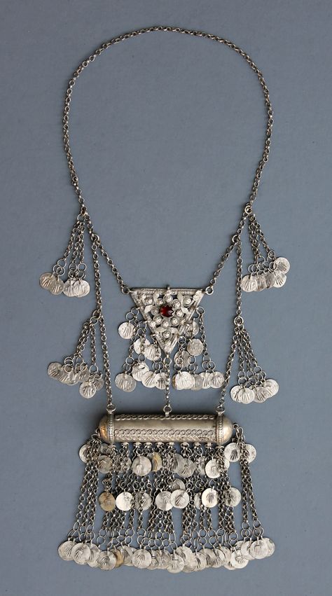 A large amulet holder necklace from rural Turkey. Called a "muskalik" (correted: masura, hamayli) for the amulet box which opens to insert papers. Many dozens of discs imprinted with hands are attached to the necklace. With filigree, appliques, and a glass stone. Probably from Western Turkey from the late 19th century. Central amulet box is 9.5cm x 11cm laid out this way 120 grams Turkish Head Jewellery, Turkey Jewellery Turkish Jewelry, Traditional Turkish Jewellery, Turkish Jewelry Ottoman, Afghan Jewelry Necklace, Turkey Jewelry, Afghani Necklace, Turkish Traditional, Afghan Jewelry