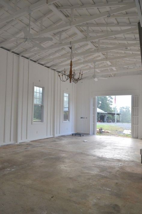 Board And Batten Garage Interior, Painted Osb Ceiling, White Garage Interior, Farmhouse Garage Interior, Barn Ceiling Ideas, Christmas Barn Decorations, Pole Barn Interior Ideas, Painted Osb, Batten Walls