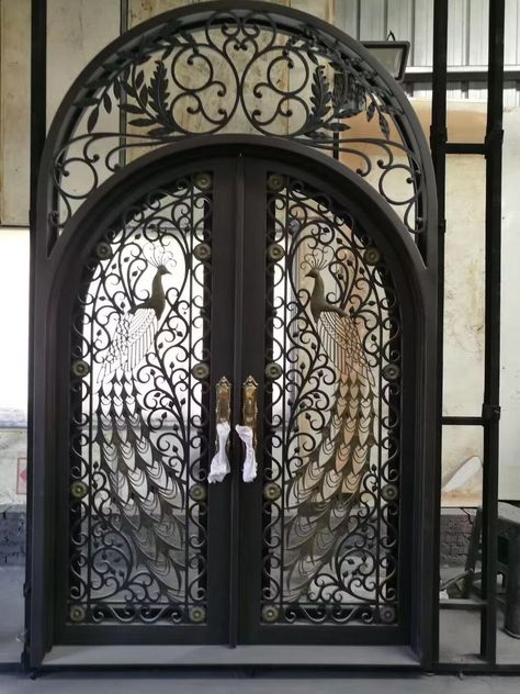 iron double exterior door with round top and transom Iron Double Door, Wrought Iron Entry Doors, Wrought Iron Front Door, Double Door Entryway, Front Door Lighting, Iron Front Door, Sacred Garden, Iron Entry Doors, Luxury Door