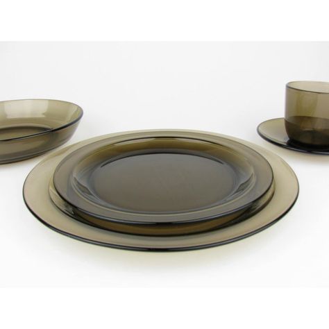 Vintage 1970s Vereco smoke brown glass dinnerware set made in France. This 40 piece set includes 8 5-piece place settings. Please see below for more information.  Dimensions: Dinner / Luncheon Plates (8) - 9.25"W x 9.25"D x 0.8"H Salad Plates (8) - 7.5"W x 7.5"D x 0.75"H Bowls (8) - 7.38"W x 7.38"D x 1.5"H Cups (8) - 3.75"W x 3"D x 2.75"H Saucers (8) - 5.25"W x 5.25"D x 0.88"H Amber Dinnerware, Brown Plates Dishes, Glass Crockery, Designer Plates, Mcm Dinnerware, Kitchen Dinner Set, Smokey Glassware, 1970s Dinnerware, Brown Plates