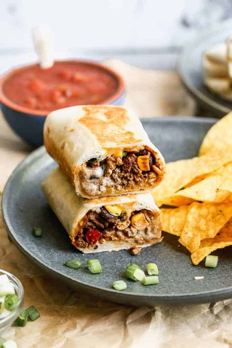 Southwest Wraps have ground beef, rice, black beans, corn, bell peppers, and onion wrapped inside a crispy and golden tortilla. This is an easy meal that take less than 30-minutes and my family loves them! Southwest Wraps, Southwest Wrap, Braised Chicken Breast, Beef Wraps, Tastes Better From Scratch, Healthy Ground Beef, Wrap Recipes, Ground Beef Recipes, Fajitas