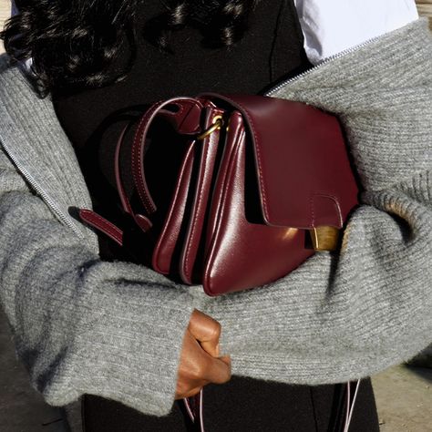 Women in Paris Are Already Wearing These Big 2024 Trends | Who What Wear Women In Paris, Street Style Handbags, Burgundy Tights, Stylish Street Style, Winter Handbags, Pretty Cardigans, Burgundy Bag, Streets Of Paris, Best Purses