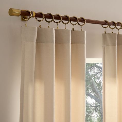 Hand-embroider or machine-embroider designs onto the curtains for a custom, artisanal feel. Brass Curtain Rod White Curtains Living Room, Curtain Rods Bedroom, Bedroom Curtain Rods, Gold Curtain Rod, Insulate Windows, Modular Sofa Living Room, Tension Rod Curtains, West Elm Curtains, Bronze Curtain Rods