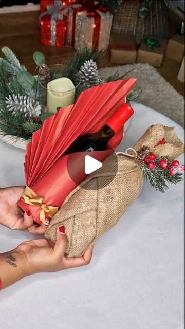 Tanya Mukendi | Queen Of Hacks 👸🏿 on Instagram: "2 Easy Ways to Wrap Wine Bottles 🎁🎄

If you're attending a Christmas dinner, birthday party, or housewarming, consider bringing a bottle of wine. Make it special by wrapping the bottle beautifully! Here are two quick wrapping techniques to try.

Which one will you choose? 

#christmas #wrappinggifts #giftwrapping #christmashacks #christmascrafts" Xmas Dinner Decorations Ideas, Wrapping A Bottle Of Alcohol, Gift Wrapping A Bottle, How To Wrap Presents Easy, Wrapping A Wine Bottle Gift, Wine Wrapping Ideas Christmas, How To Wrap A Bottle Of Wine, Ways To Wrap Wine Bottles, How To Wrap Wine Bottles Gift