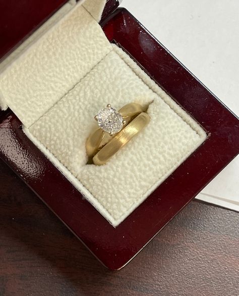 A beautiful set completed for the sweetest couple! One carat Oval diamond, pinched band engagement ring, completed with a brushed finish. Stunning! #HollandsJewelry #finejewelry #wheretraditionsbegin #traditionssince1918 #shoplocal #familyowned Engagement Rings Pinched Thick Bands, Tapered Ring Band, Antique Engagement Rings Thick Band, Thick Band Rings Engagement, Tapered Engagement Ring With Band, Gold Wedding Rings Thick Band, Tapered Band Engagement Ring, Engagement Ring Thick Gold Band, Thick Gold Wedding Ring