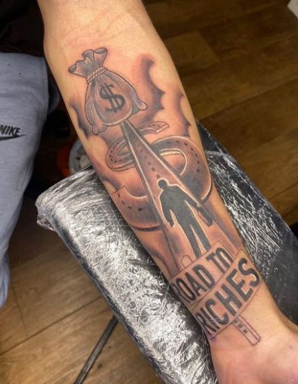 Road To Riches Money Tattoo Money Tattoo Forearm, Road To Success Tattoo, Roads To Riches Tattoo, Tattoo Ideas For Men Money, Road To Riches Tattoo Stencil, Road To Riches Tattoo Design, Rags To Riches Tattoo, Rich Tattoo Ideas, Pathway Tattoo