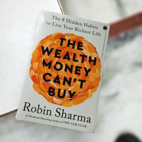 Book : The Wealth Money can’t buy by @robinsharma In the vast and often repetitive landscape of self-help literature, Robin Sharma’s “The Wealth Money Can’t Buy: The 8 Hidden Habits to Live Your Richest Life” emerges as a refreshing beacon of wisdom and practical insight. This book transcends conventional paradigms of wealth, offering readers a holistic approach to prosperity that encompasses far more than financial success. The author’s adept use of short anecdotes and parables serves to ... Robin Sharma Books, 5am Club, Success Books, Money Cant Buy, Robin Sharma, Rich Life, Holistic Approach, Financial Success, Books To Buy