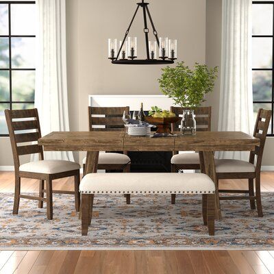 Three Posts™ Sitting down for a meal doesn’t always have to be so stuffy and formal, this five piece dining set is perfect for a casual meal with family or a night in with friends playing board games. This manufactured wood dining set is a great addition to traditionally styled aesthetics, and includes one rectangular table with an included leaf to further extend the table, four matching chairs, and a matching bench. The table measures 78'' L x 42'' W x 30'' H when fully extended. This set requi Breakfast Nook Dining Set, Nook Dining Set, Friends Playing, Farmhouse Dining Room Table, Solid Wood Dining Set, Kitchen Dining Sets, Counter Height Dining Table, 7 Piece Dining Set, Counter Height Dining Sets