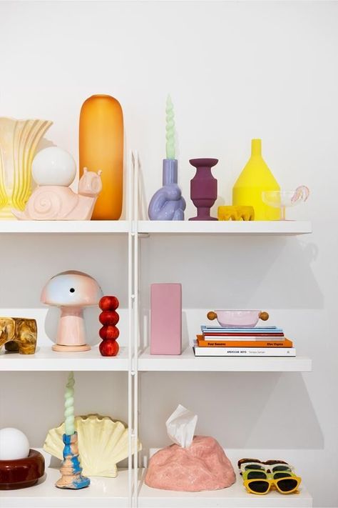 White open shelving decorated with objects in bold and repetitive tones. Some of the witems are from Maison Balzac, Dinosaur Designs and Rainbow Studios mixed with vintage items | Photography: Jem Cresswell | Styling: Anna Delprat | Story: Real Living Decorating Living Room Shelves, Items Photography, Quirky Apartment, Colorful Shelf, Spanish Style Home, Riso Print, Living Room Shelves, Quirky Home Decor, Elegant Living Room