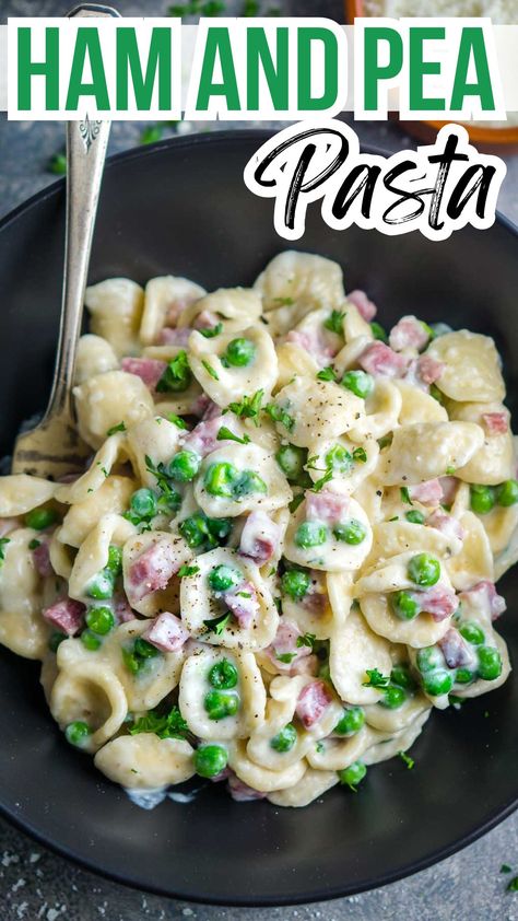 image of creamy ham and pea pasta in black bowl with eating utensil. Title text: Ham and Pea Pasta Mac And Cheese With Ham And Peas, Ham Noodles And Peas, Pea Ham Pasta, Cheesy Ham Pasta, Pasta Ham And Peas, Pea And Ham Pasta, Ham Alfredo Pasta, Creamy Pea Pasta, Ham And Peas Pasta