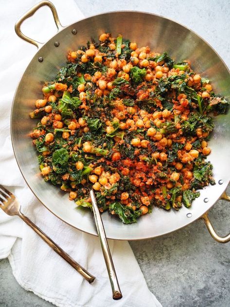 Spanish Chickpeas and Kale! This easy dish of sauteed kale and chickpeas is served is a rich tomato sauce. Serve with crusty bread for a budget friendly dinner. #rachaelhartleynutrition #thejoyofeating #tapas #spanishrecipe #chickpeas #vegetarian #vegan #vegetarianrecipes #veganrecipes #healthyrecipes Spanish Chickpeas, Kale Dishes, Spanish Tapas Recipes, Kale Recipe, Salad Kale, Lenten Recipes, Sauteed Kale, Tapas Recipes, Party 2023