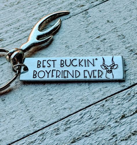 "Please leave a phone number in the checkout notes in case I need to call or text to get more information. Thanks. PLEASE READ SHOP ANNOUNCEMENT AND POLICIES. This adorable Keychain is the perfect gift for the outdoorsy guy in your life!! Hand Stamped with: A buck. \"Best Buckin' Boyfriend ever.\" Antler charm All of our items are hand stamped by me and not a machine, so spacing and alignment may be imperfect, which can add to the charm and character of hand stamped jewelry. Because of the uniqu Hunting Gift Ideas, Birthday Gifts For Country Boyfriend, Hunting Boyfriend Gifts, Hunting Basket For Boyfriend, Outdoorsy Gifts For Him, Deployment Gifts For Boyfriend, Gift Ideas For Country Boyfriend, Gifts For Cowboy Boyfriend, Country Boyfriend Christmas Gift Ideas