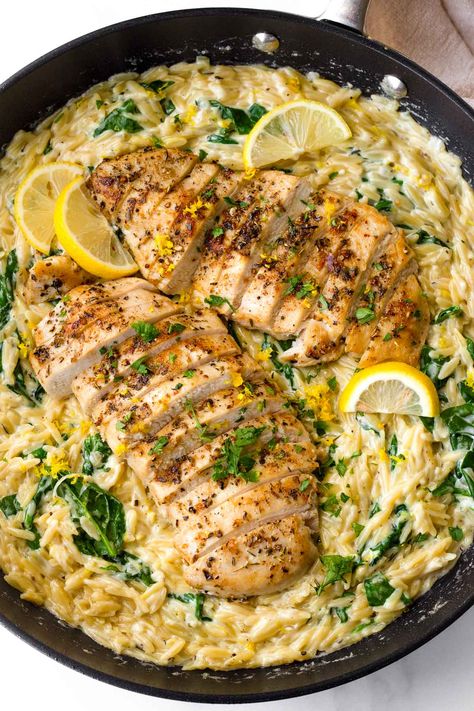 Lemon Chicken Orzo! This creamy one pot lemon chicken orzo is perfect for weeknights, and an amazing comfort food recipe. The orzo is tender, and it's tossed with fresh lemon and spinach. Healthy Meal Ideas Chicken, Lemon Chicken Skillet Dinner, Lemon Chicken Broccoli Rice, One Skillet Lemon Butter Chicken And Orzo, One Skillet Crispy Chicken Thighs & Creamy Lemon Garlic Orzo, Chicken Lemon Risotto, Orzo Al Limone Recipe, Food Hack Recipes, Lemon Garlic Chicken And Rice