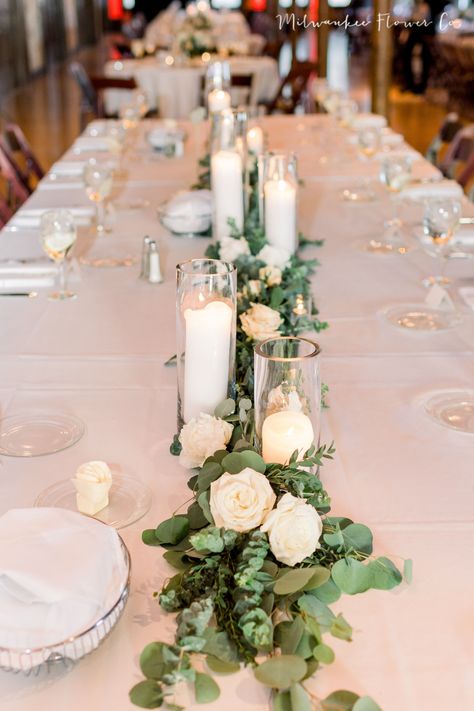 Rectangular Table Florals Wedding, Wedding Tablescapes Greenery, Kings Table Wedding Decor, Candles Table Decor Wedding, Wedding Table Greenery And Candles, Champagne Wedding Centerpieces, Rectangle Wedding Table Decor, Long Table Wedding Centerpieces, Champagne And Greenery Wedding