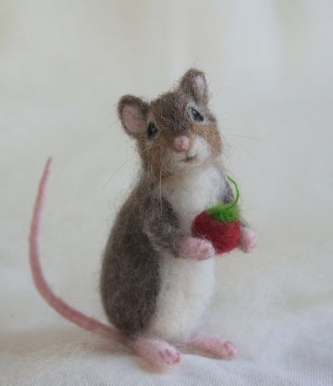 A whimsical, yet realistic grey brown mouse created of wool and alpaca. This little mouse has a wire frame which allows him to be posed and his hands can hold small things. He is holding a real berry in the photo, which is not included. However, you can choose a tiny berry made of Maus Illustration, Felted Mice, Felt Mice, Needle Felted Mouse, Felted Mouse, Needle Felting Diy, Wool Needle Felting, Wool Animals, Pet Mice