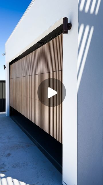 TOWER GARAGE DOORS AUSTRALIA on Instagram: "Seamlessly blending aesthetics and durability, this aluminum sectional door is meticulously clad with 40x40 aluminum battens, offering a contemporary and sturdy entrance solution." Aluminum Garage Doors Modern, Garage Entrance To House, Car Entrance, Contemporary Garage Doors, Modern Carport, Garage Windows, Garage Entrance, Sectional Garage Doors, Modern Garage Doors