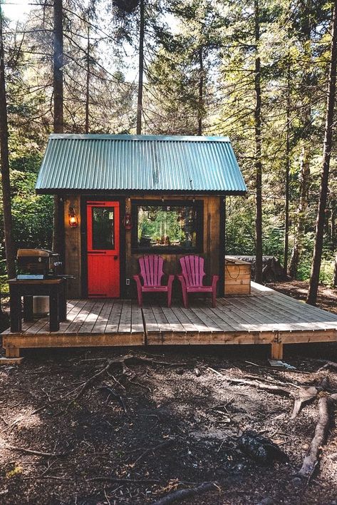 It cost him $2,000 to build not including the recycled doors and windows, the front porch, and the solar system. Here’s how to build yours from scratch.... #tinyhouse Tremblant Quebec, Micro Cabin, Mont Tremblant, Forest Cabin, House Cabin, Tiny Cabins, Little Cabin, Tiny Cabin, Tiny House Movement