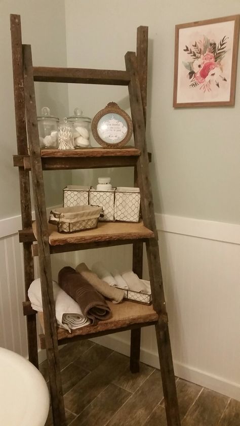 Farmhouse-Ladder shelf: Made out of 100 year old wood, used for bathroom toiletries and storage. Very rustic Ladder Shelf Wooden, Over The Toilet Storage Ideas Farmhouse, Ladder Shelf In Bathroom, Vintage Ladder Shelf, Bathroom Bookshelf Storage, Ladder Decor Bathroom, Ladder Shelf Decor Bathroom, Old Ladder Shelf, Room Shelves Decor