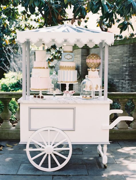 Wedding reception Paris theme dessert pastry cart with three cakes and macaron sphere with pastries Dressing Stand, Wedding Bar Cart, Dessert Cart, Gerobak Dorong, Display Tables, Paris Flowers, Sweet Carts, Parisian Wedding, Deco Champetre