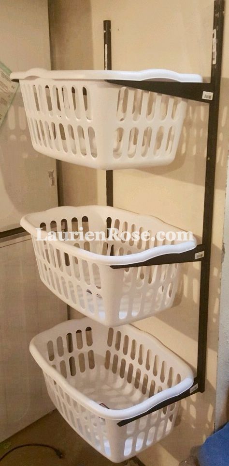 Super simple hanging laundry basket DIY to help you sort out life one load at a time. :] Laundry Basket Storage Diy, Laundry Basket Shelves, Basket On Wall, Laundry Basket Dresser, Laundry Basket Holder, Laundry Room Baskets, Diy Laundry Basket, Laundy Room, Laundry Sorting