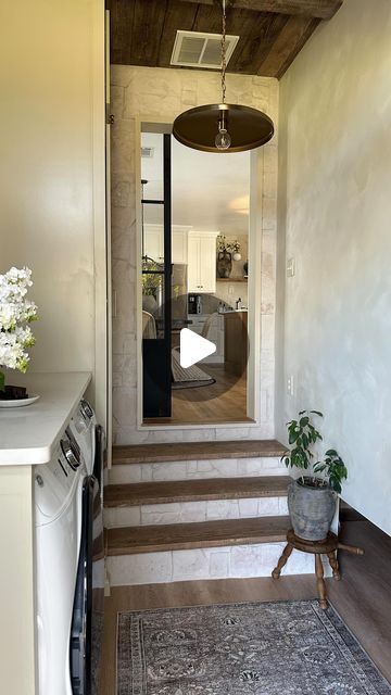 Kristina Evans on Instagram: "From my dirty garage to a stunning entryway into my home. What’s your favorite part? Limewash wall? Stone? Wood steps? Ceiling details? Brass lights?! I can’t decide I love it all so much. Here’s the first video into seeing my finished laundry room! Follow along to see more! . . #organicmodern #modernhome #earthytones #earthydecor #laundryroom #laundryroomdesign #modernorganic #europeanfarmhouse" Finished Laundry Room, Limewash Wall, Brass Lights, Limewash Walls, Ceiling Details, Earthy Decor, Wood Steps, European Farmhouse, Ceiling Detail