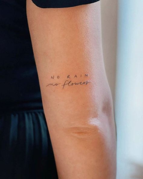 No rain 🌧️, no flowers 💐 by @there.ttt · Perpignan 🇫🇷 | Instagram No Rain No Flowers Tattoo, Above Elbow Tattoo, Tattoo Word Fonts, Inner Elbow Tattoos, Enough Tattoo, Strong Tattoos, Tato Jari, Tattoo Schrift, Petite Tattoos