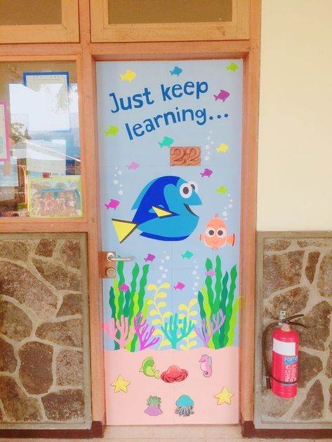 Under the Sea themed door display: "Just keep learning....." from Finding Dory Classroom Door Decor Ideas, Preschool Classroom Themes, Summer Bulletin Board, Preschool Door, Classroom Door Decor, Door Decor Ideas, Disney Themed Classroom, Summer Bulletin Boards, Ocean Theme Classroom