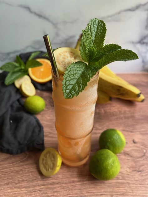 This Banana Guava Tiki Cocktail combines white rum, overproof rum, cinnamon whiskey, guava and banana liqueur, and lime and orange juice. Banana Tiki Cocktail, Bar Knowledge, Tiki Drinks Cocktails, Banana Liqueur, Tiki Drink, Tiki Cocktail, Cinnamon Whiskey, Hey Bartender, Liquor Recipes