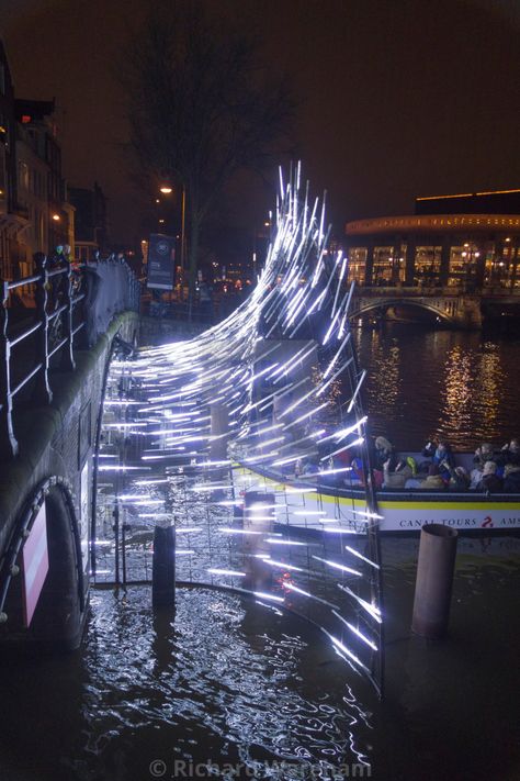 "Amsterdam The Netherlands Amsterdam Light Festival. A canal boat passes through a light installation at the entrance to the Herengracht canal." by Richard Wareham - US$112.46 Festival Entrance, Venue Entrance, Light Sculpture Installation, Lighting Festival, Amsterdam Light Festival, Led Installation, Led Light Installation, Light Structure, Festival Of Light