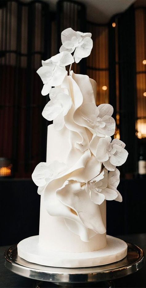 Unique White Wedding Cakes, Wedding Cakes Orchids, Avant Garde Wedding Cake, Draped Wedding Cake, Sculptural Wedding Cake, White Orchid Wedding Cake, Modern Wedding Style, Abstract Wedding Cake, Big Wedding Cakes Elegant