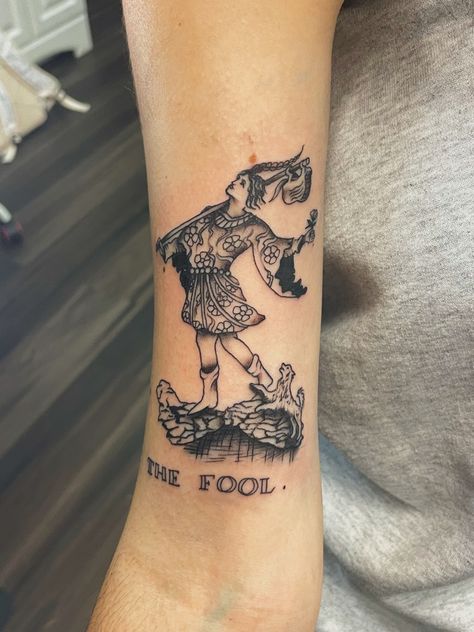 The Fool Tattoo Design, The Fool Aesthetic, The Fool Tattoo, The Fool Tarot Tattoo, Fool Tattoo, Beetle Tattoos, Film Tattoo, Jester Tattoo, Lower Arm Tattoos