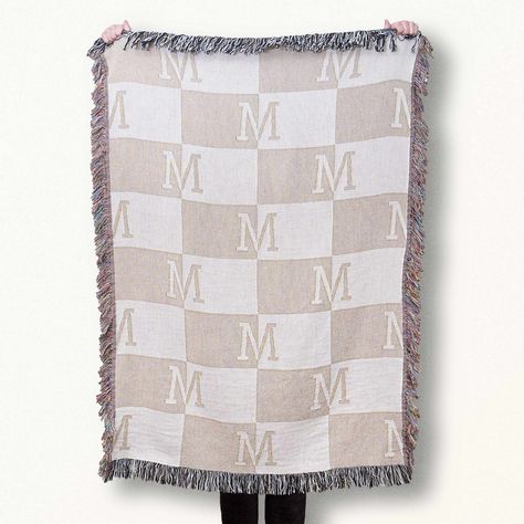 This Personalized Checkered Blanket features your chosen initial, highlighted by two complementary colors for a vibrant touch. It makes a thoughtful gift or a warm addition to any room in your home. Crafted with care from 100% cotton, our soft and inviting blanket features a classic checkered pattern that effortlessly complements any interior. What truly sets it apart is the ability to add your own initials and choice of color. Our customization option allows you to create a one-of-a-kind keepsake that will last a lifetime. 100% cotton, fully woven blanket Machine washable on low heat Colorful fringe Double sided (Standard weave design on the front, negative on the back) Made in America Wedding Pennant, Custom Throw Blankets, Tapestry Quotes, Tapestry Blanket, Pennant Banners, Woven Blanket, Checkered Pattern, Complementary Colors, Tapestry Weaving