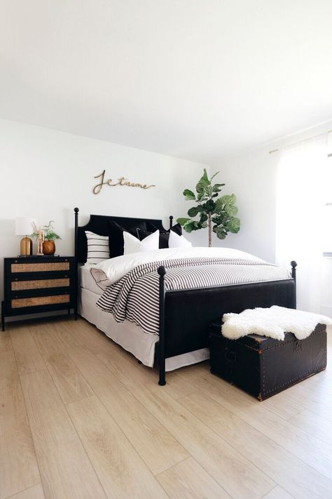 Bedroom With Black And Gold Accents, All White Bedroom With Black Accents, Rugs In Bedroom Black And White, Black Cane Nightstand Bedroom, Black And Gold Furniture Bedroom, Guest Bedroom Black And White, White And Black Bedroom Decor, Black And White Guest Room, White With Black Accents Bedroom