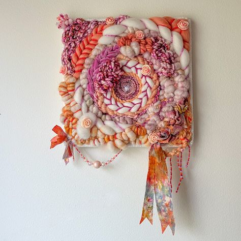 'Peach Crush' is handwoven on a 9 inch square frame with Handwoven Art Yarn, Indie Dyed Yarn, Merino Wool Roving, Silk Velvet, Botanically Dyed Ribbon, acrylic and Glass beads! All weavings are one of a kind and  handwoven, by me, in my home in Vermont.  I love to use color and texture to create movement in my pieces and  I try to source the majority of my materials from other small, woman owned businesses.  When you purchase my art, you are not just supporting me, you are supporting so many oth Peach Crush, Art Yarn Weaving, Weaving Wall Hanging, Art Yarn Handspun, Indie Dyed Yarn, Spin Art, Fun Arts And Crafts, 9 Square, Home Decor Boho