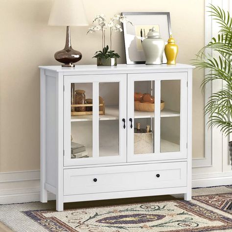 Amazon.com: SSLine White Wood Buffet Sideboard Kitchen Server Storage Cabinet Cupboard with a Large Drawer and 2 Glass Doors Modern Elegant Buffet Cabinet Entryway Console Side Tables for Living Room Bedroom: Kitchen & Dining Sideboard In Living Room, White Buffet Cabinet, Server Cabinet, White Buffet, Double Glass Doors, Buffet Server, Decoration Styles, Kitchen Sideboard, Double Glass